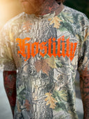 Camo Tee With Orange lettering that reads, "Hostility" Streetwear 