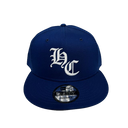 royal blue snapback hat with white logo